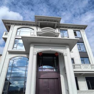 石嘴山白麻别墅外墙干挂石材效果示例