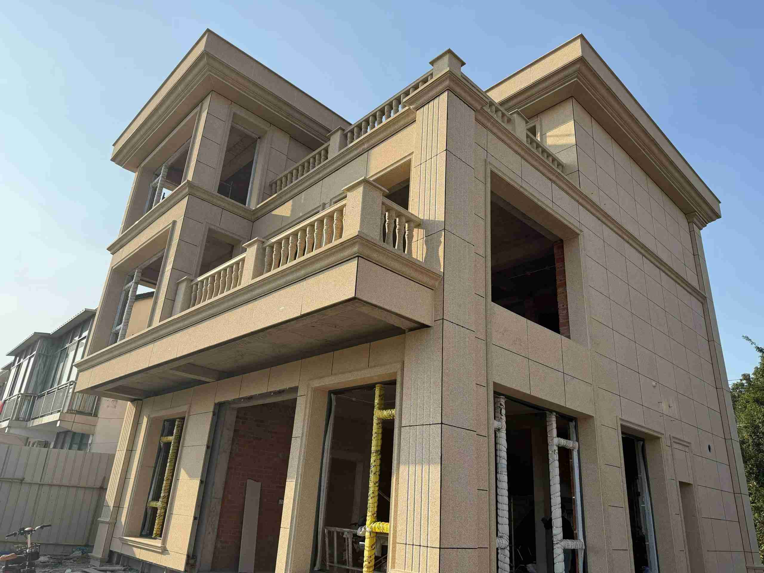 石嘴山 黄金麻花岗岩石材荔枝面外墙干挂效果展示