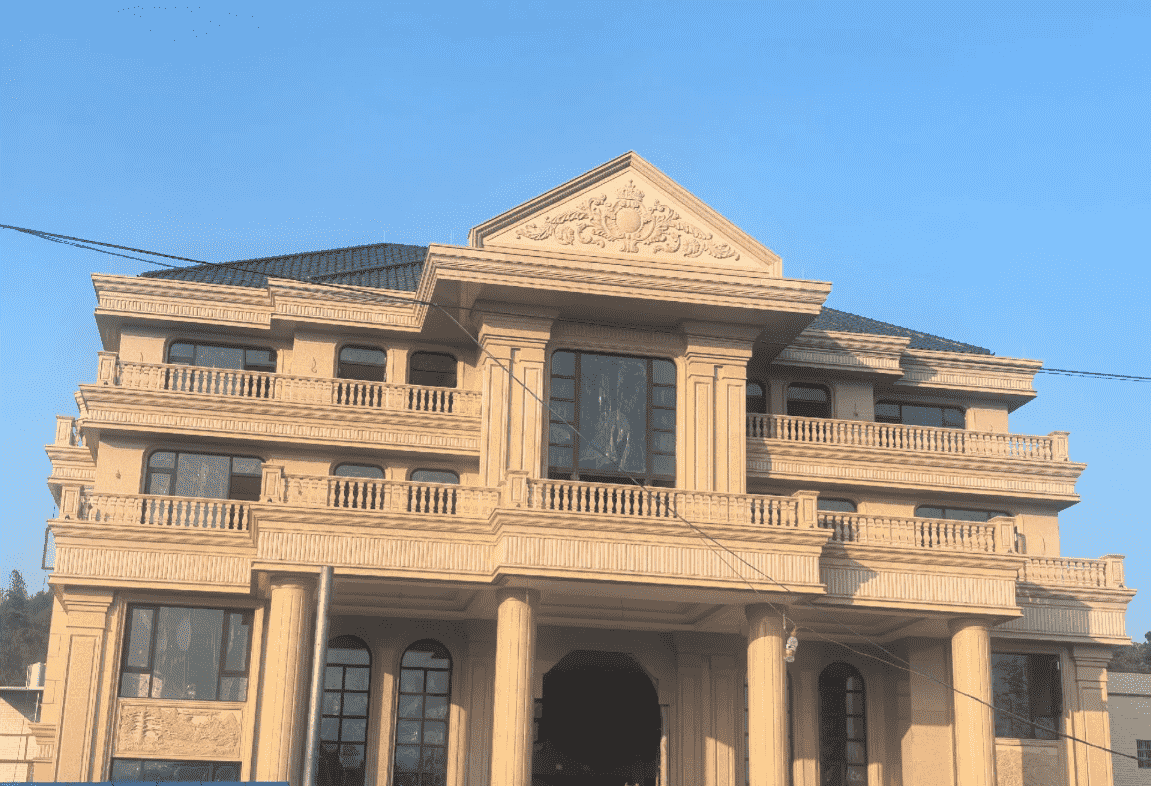 石嘴山黄金麻别墅外墙干挂石材效果示例