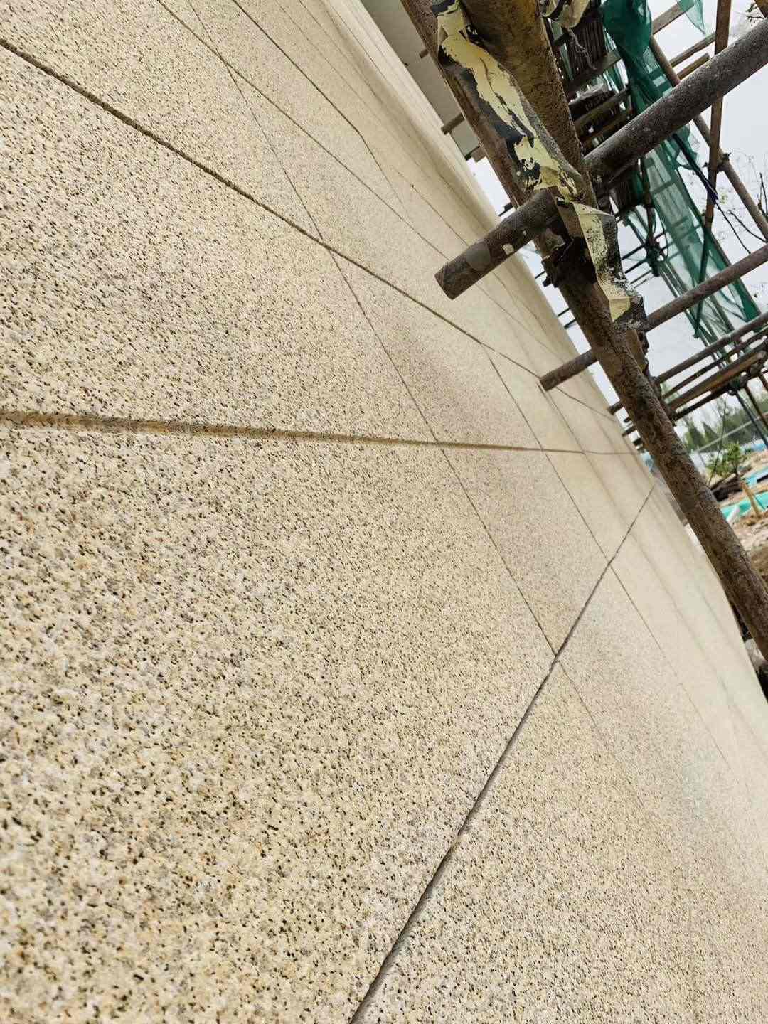 石嘴山 黄金麻花岗岩荔枝面外墙干挂石材效果示例